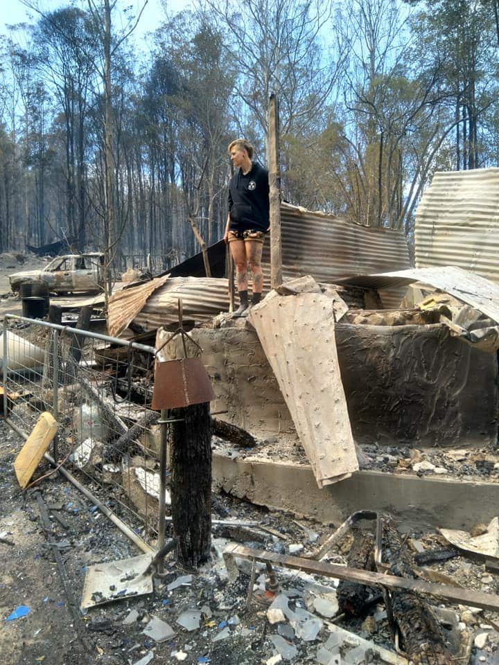Fiona Lee pictured in 2019 when her house was burnt down in a bush fire