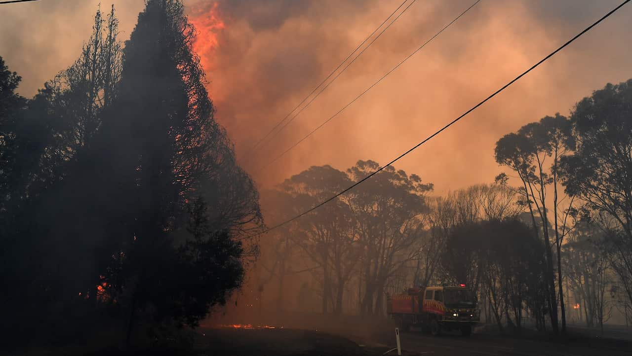 Fire threatens a number of communities in the south west of Sydney on 19 December 2019.