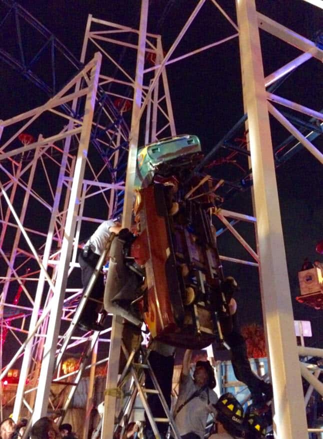 Daytona Beach firefighters in the process of rescuing riders from a rollercoaster incident. 
