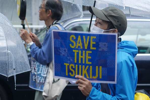Demonstrators protest against the impending move of the Tsukiji fish market to Toyosu in Tokyo.