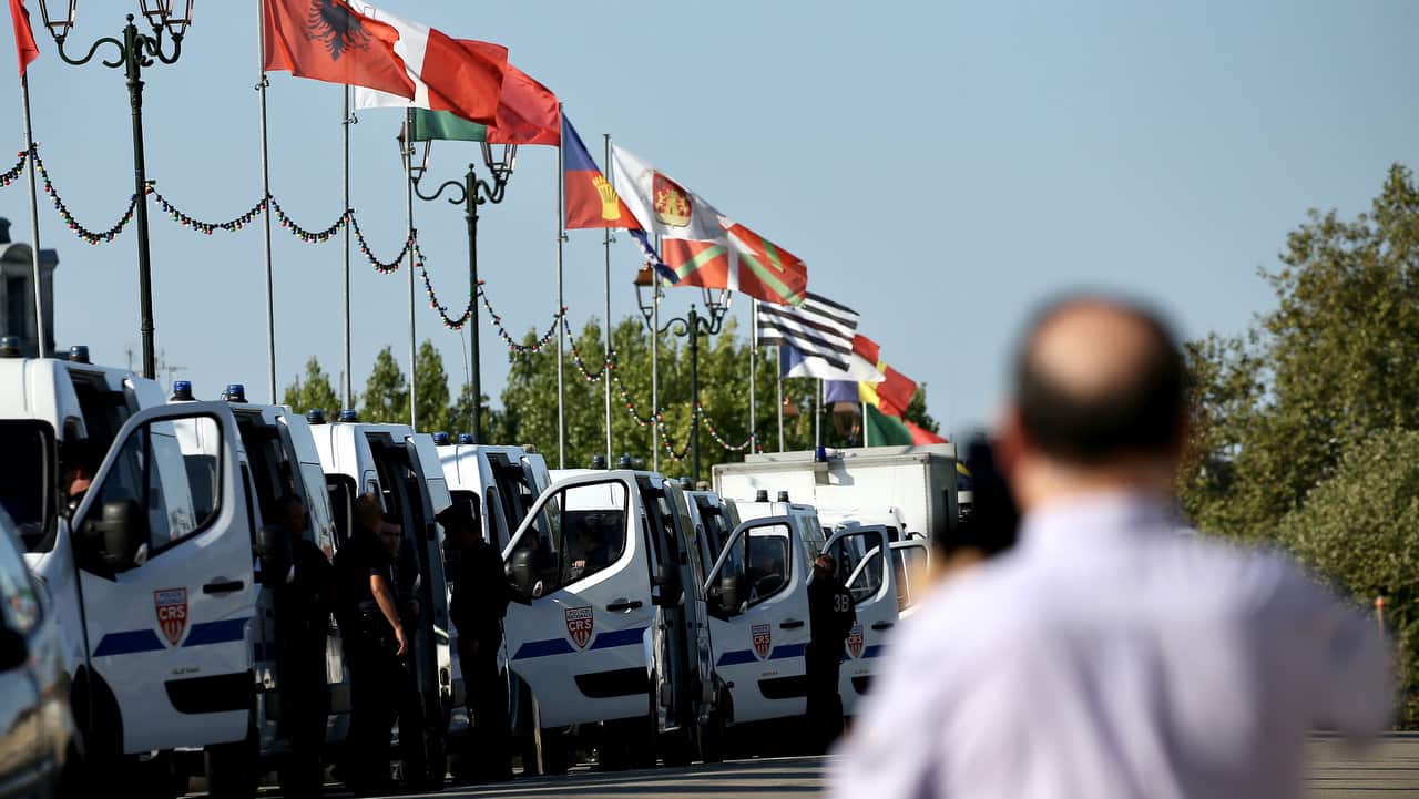 Vehicles of French police in line on a bridge in Bayonne, near Biarritz,  France.