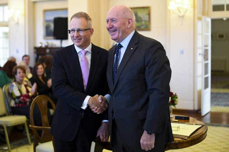 Paul Fletcher MP (left) shakes hands with Australian Governor-General Sir Peter Cosgrove as he's sworn into office.