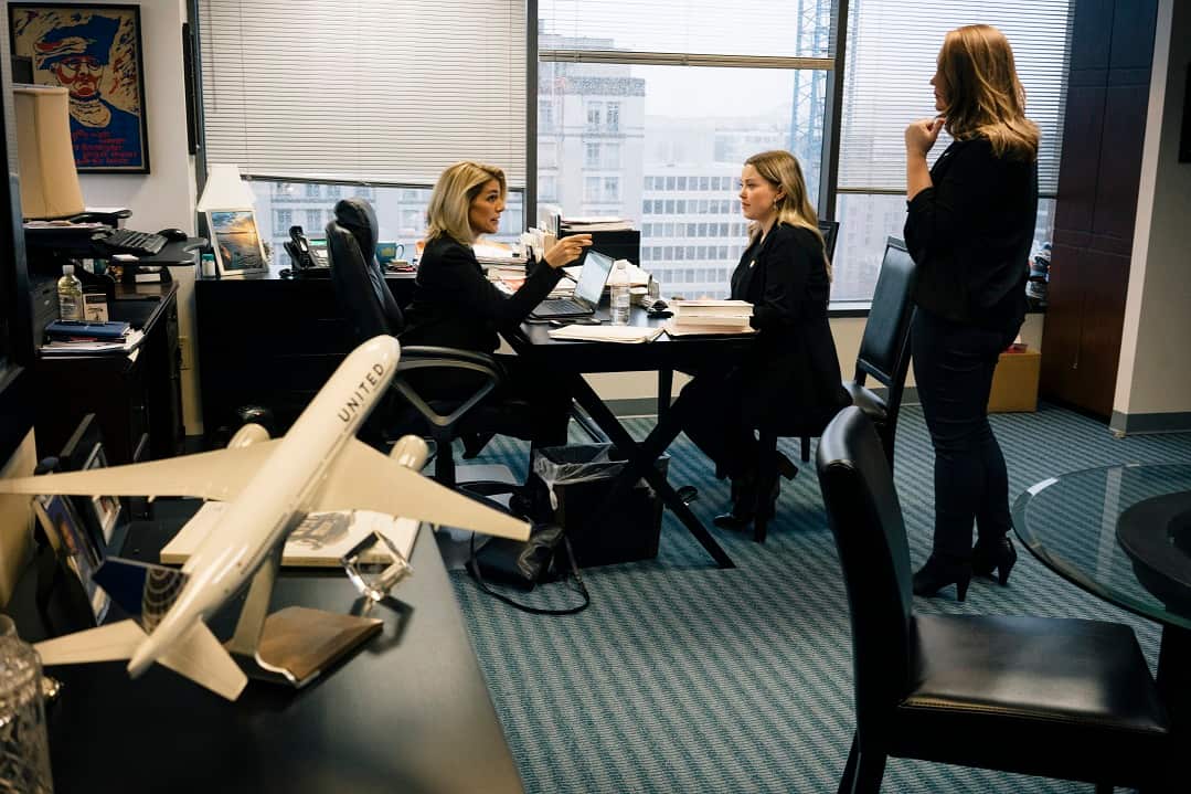  Sara Nelson, left, head of the flight attendants union, speaks with Taylor Garland, strategic public relations coordinator, in Washington.