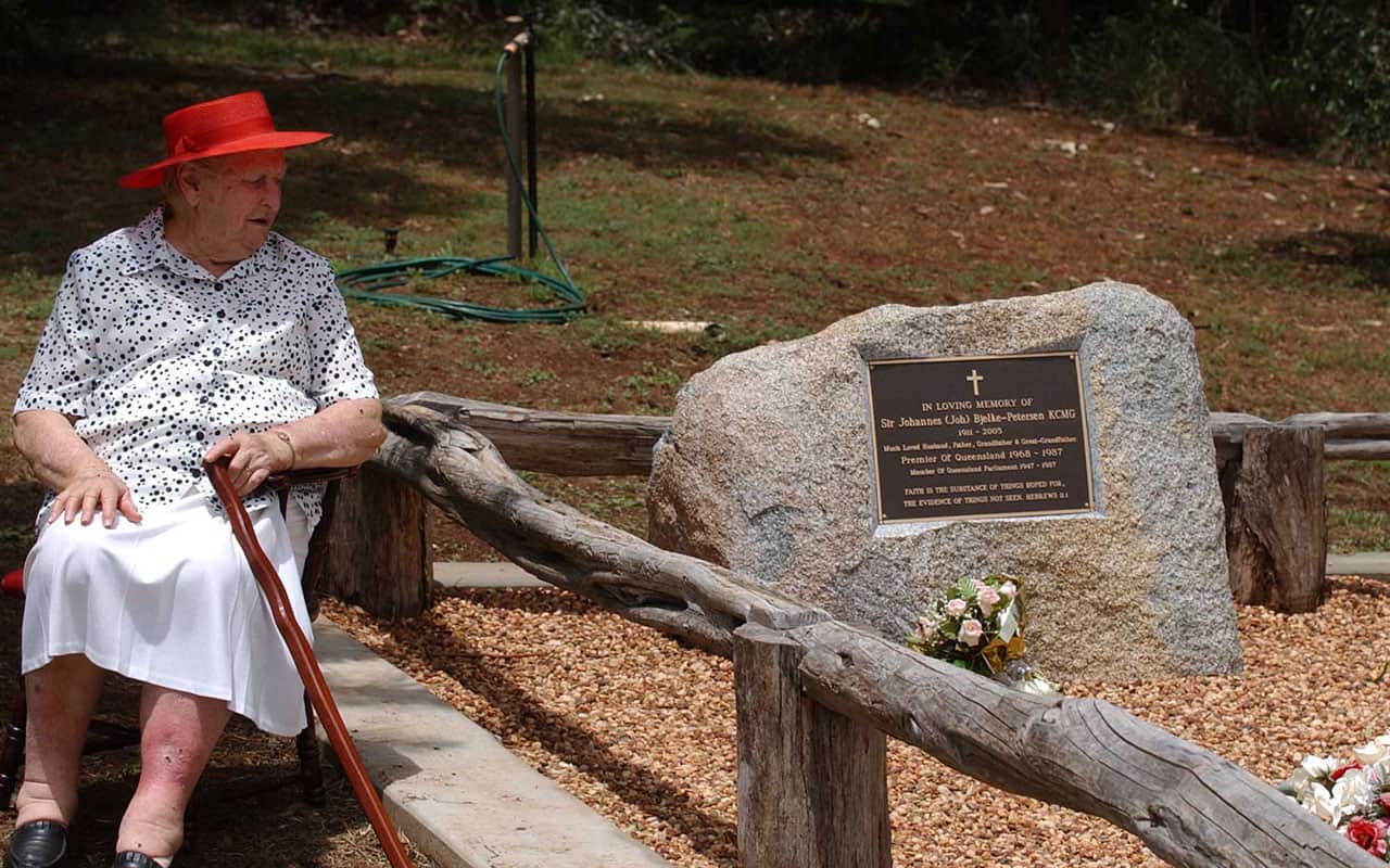 Lady Flo Bjelke-Petersen at the grave of Sir Joh Bjelke-Petersen on the family property Bethany at Kingaroy, north west of Brisbane, Monday, Feb. 6, 2006. 