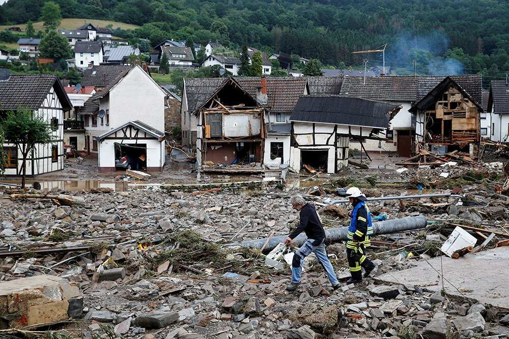 Severe weather across western Europe has turned streams and streets into raging torrents that swept away cars and caused houses to collapse.
