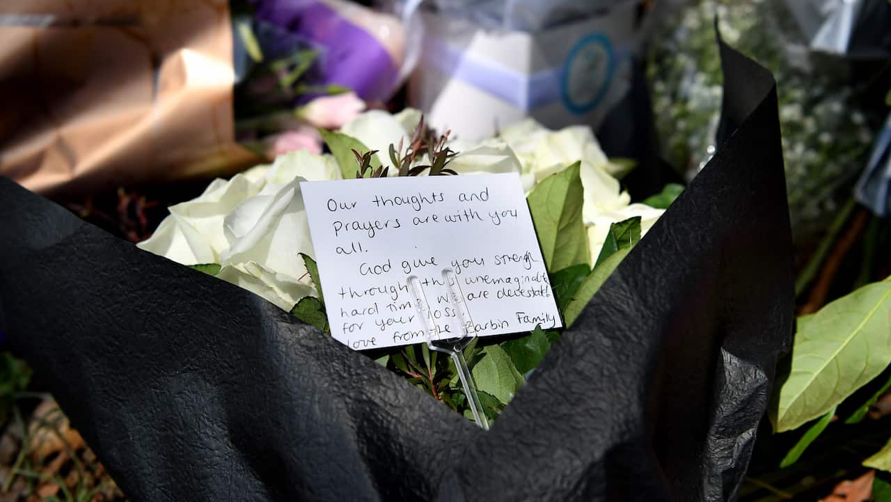 Flowers placed at the scene where seven children where hit on a footpath by a four-wheel drive in the Sydney suburb of Oatlands.