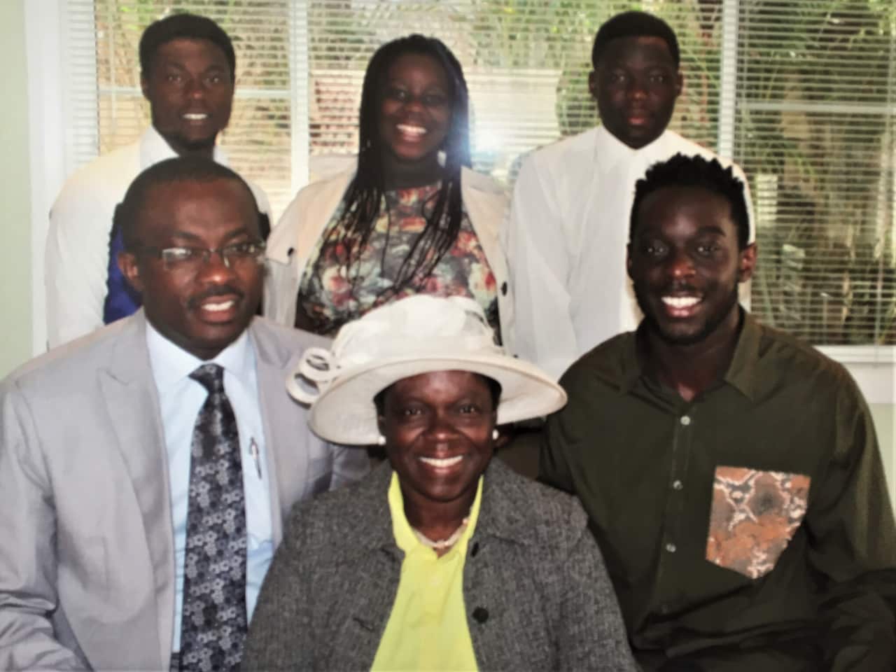 Florence (centre front) with her husband Solomon (left) their three sons and daughter Shallom (centre back row)
