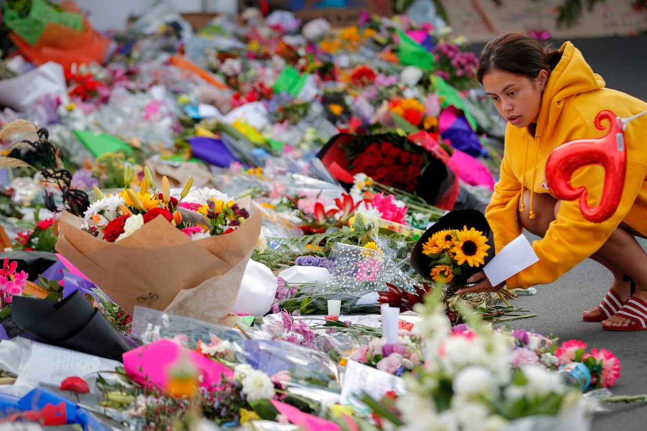 Mourners lay flowers near the Linwood mosque in Christchurch, New Zealand.
