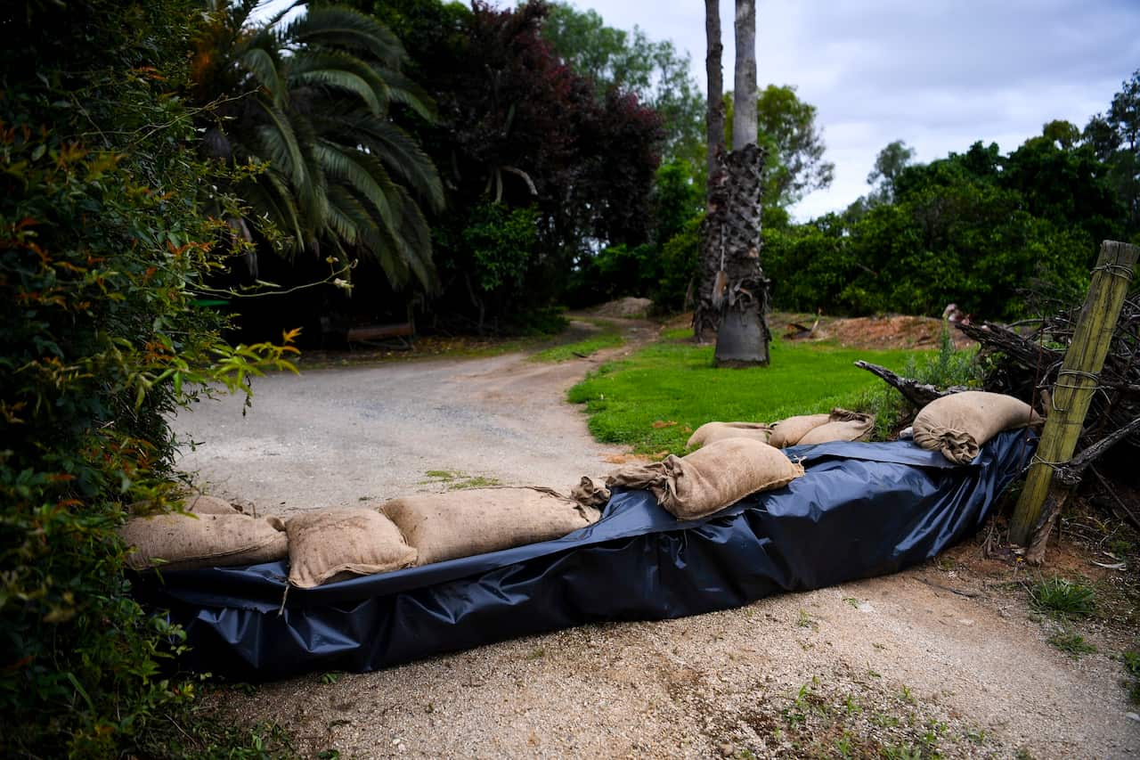 Sandbags are seen outside a house in preparation of flooding in the NSW town of Forbes.