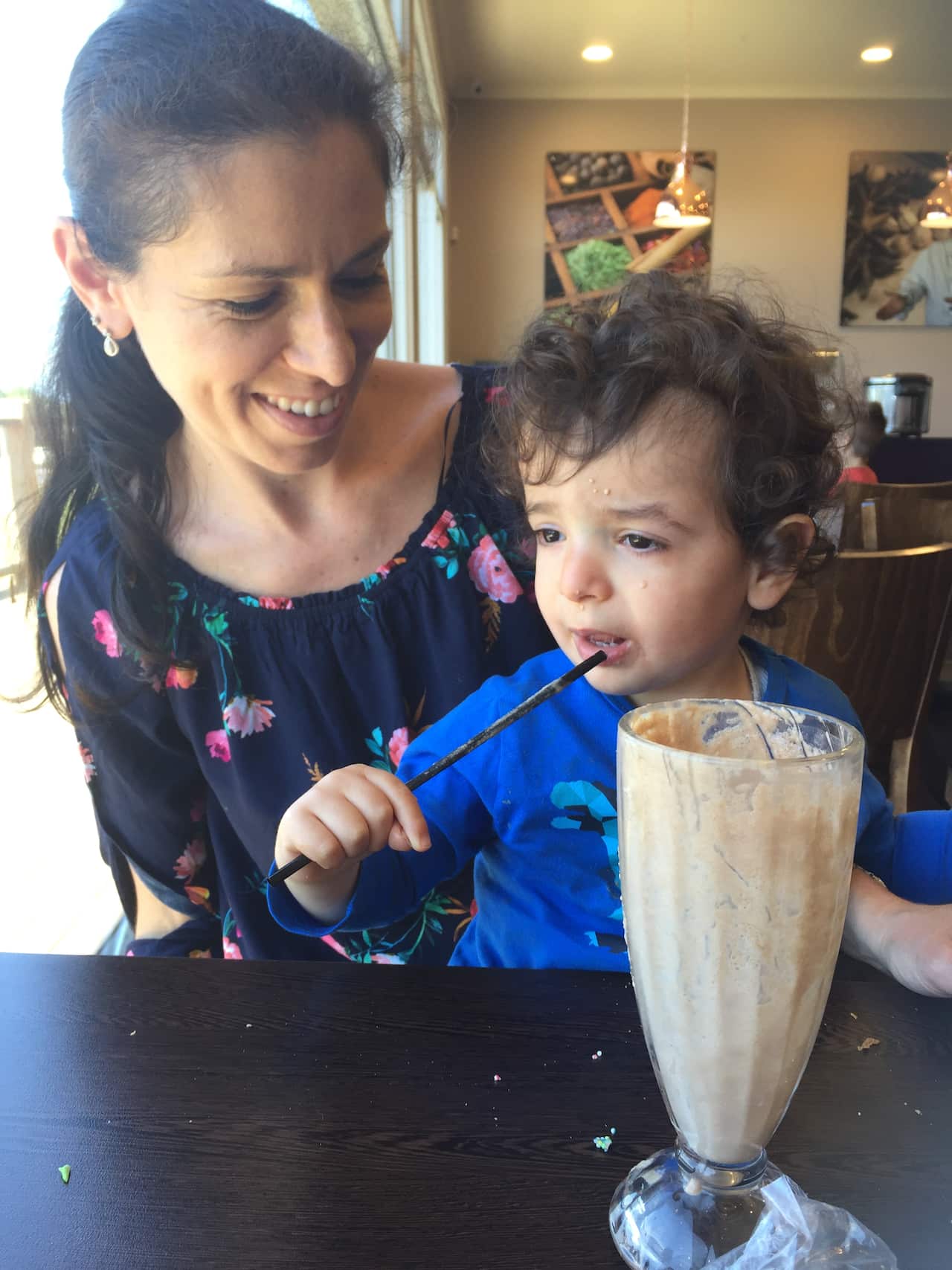 Christina Guastalegname and son Frankie enjoying a milkshake.