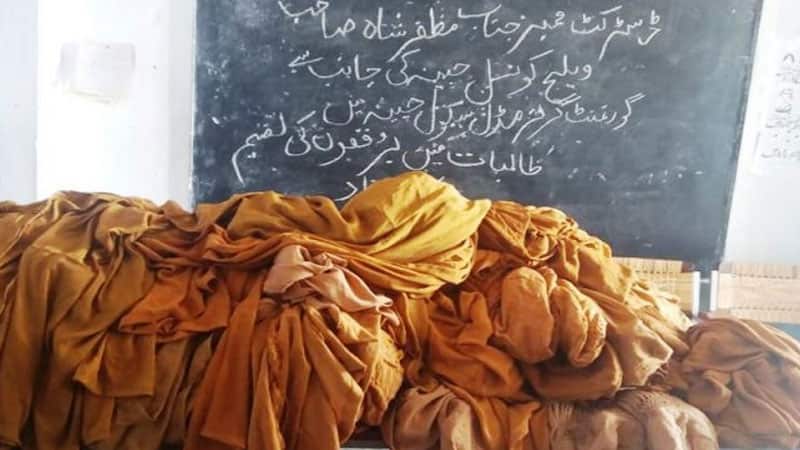 This photo of the free burqas caused outrage on social media. 