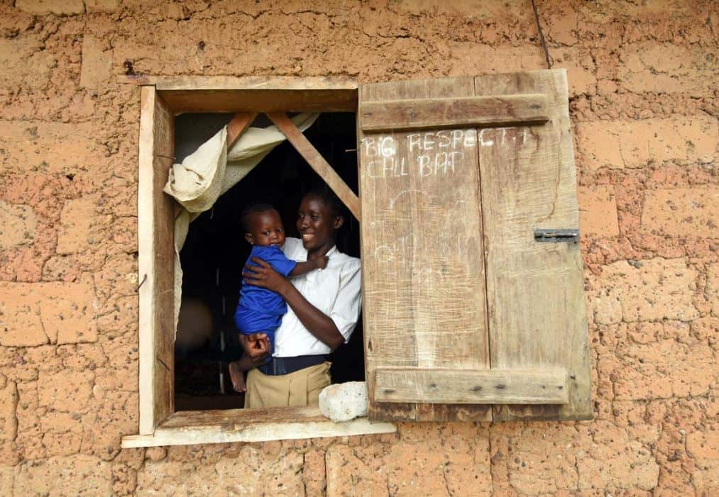 Mariatu Sesay and her daughter. She says she's delighted to return to school.