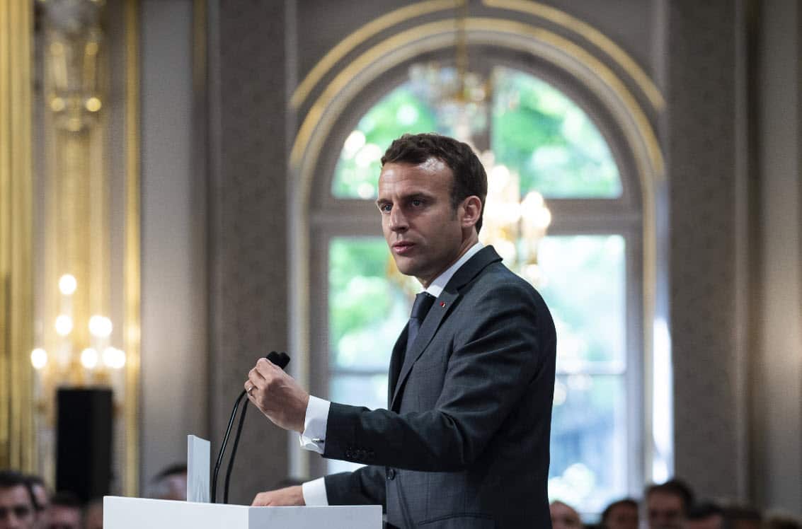 French President Emmanuel Macron delivers a speech during thanks to the firefighters who intervened at Notre dame de Paris Firefighters arrive at the Elysee palace on April 18, 2019 in Paris (AAP)