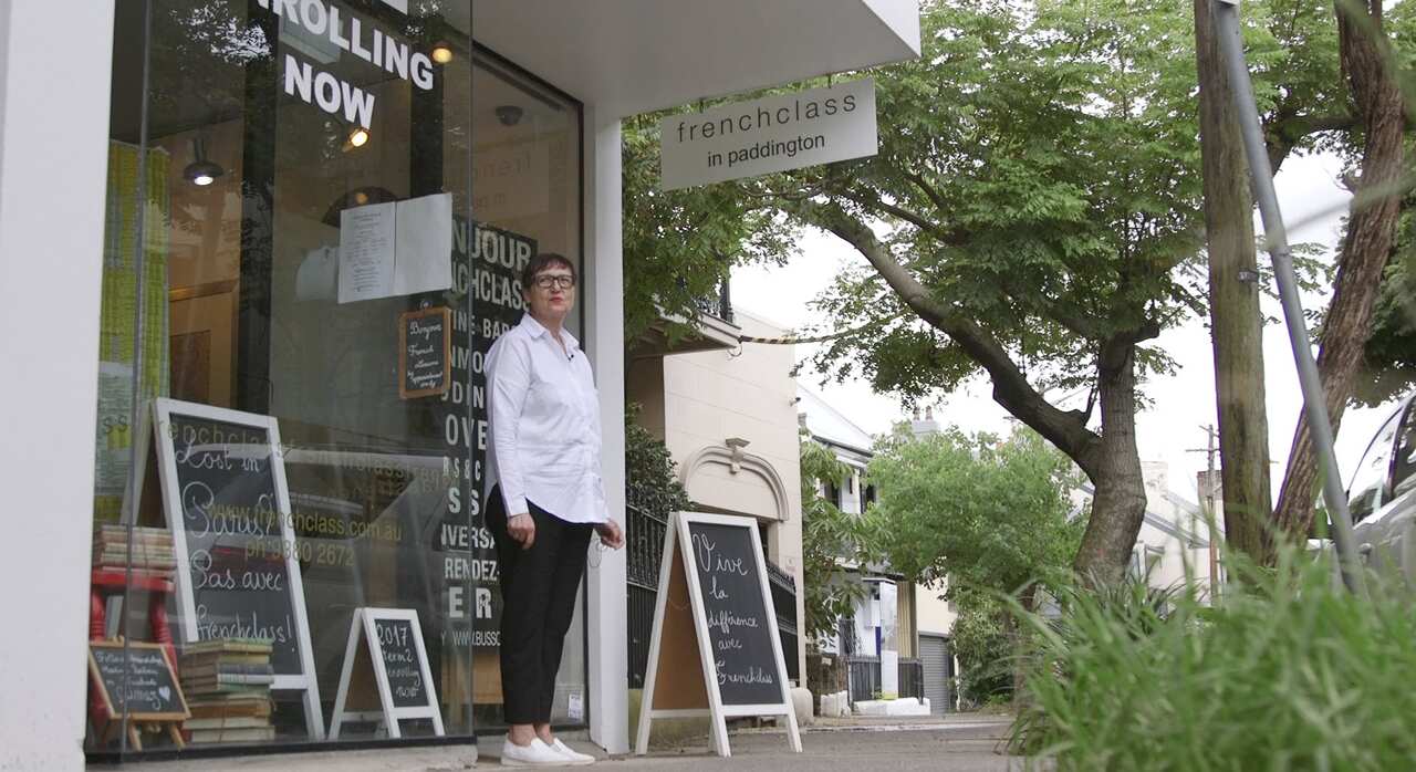 Martine waits for students to arrive at her language school, frenchclass.