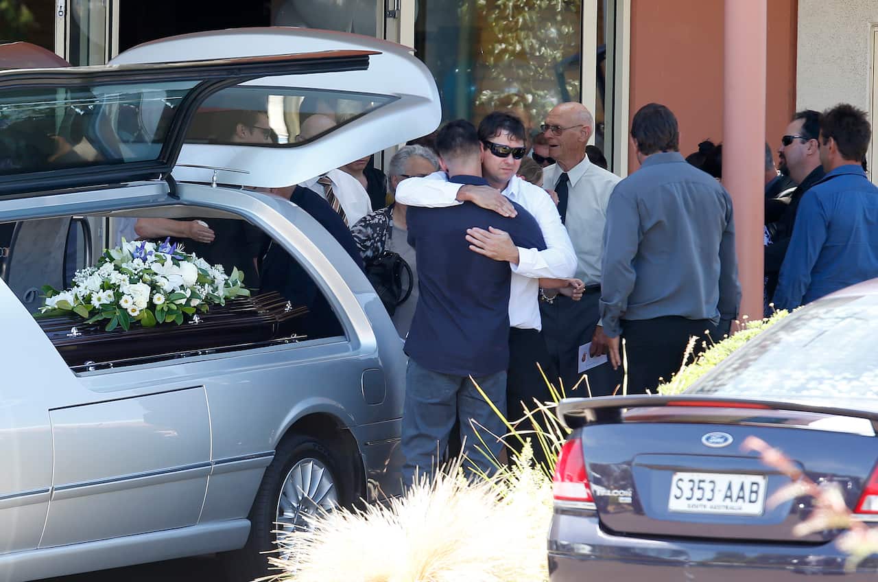 Mourners at the funeral of Damien Little and his two sons, Koda, and Hunter, at Unity Hill Christian Ministries Centre in Port Lincoln