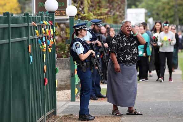Mourners attend the memorial service.