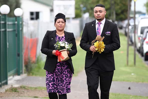 Mourners react as they carry the body of a victim of the Friday March 15 mosque shootings for a burial at the Memorial Park Cemetery in Christchurch.