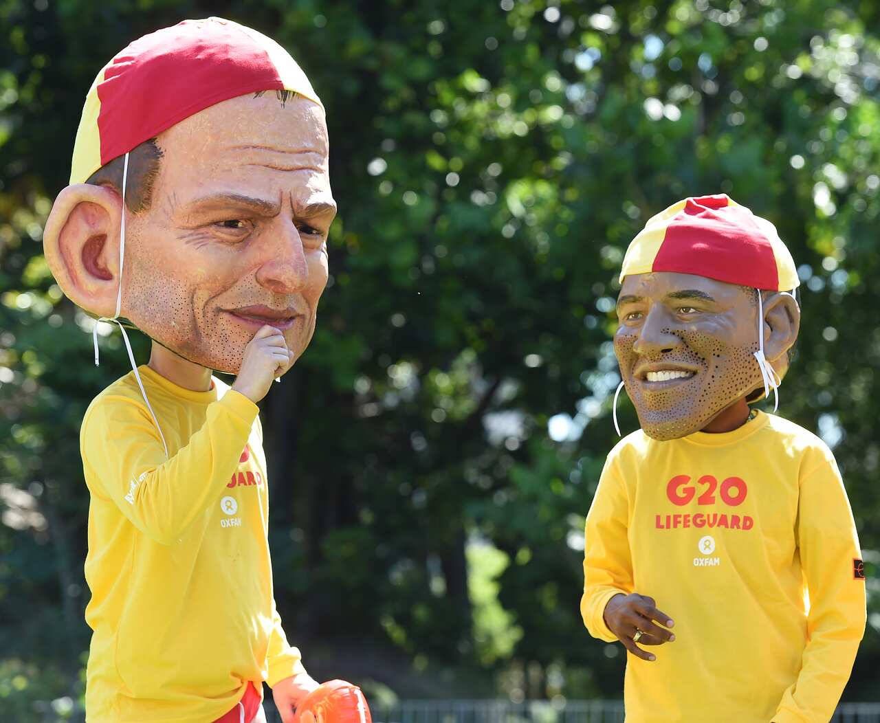 Caricatures of Prime Minister Tony Abbott and US President Barack Obama (AAP Image/Dave Hunt)