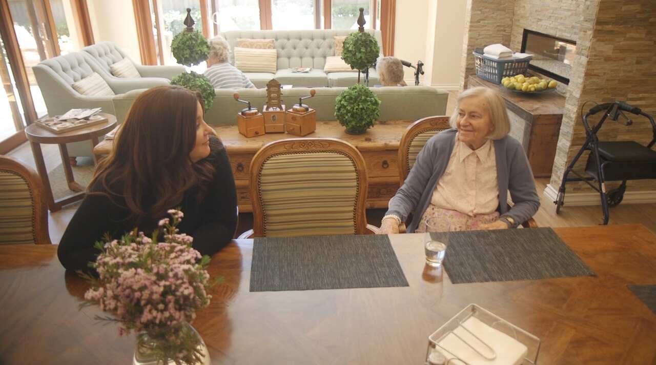 Tamar Krebs chats with residents at her St. Ives property