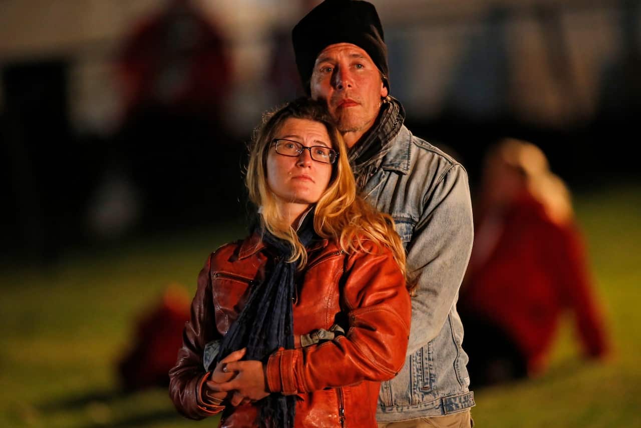 People weight for the Dawn Service ceremony at the Anzac Cove beach, the site of World War I landing of the ANZACs (Australian and New Zealand Army Corps) on April 25, 1915