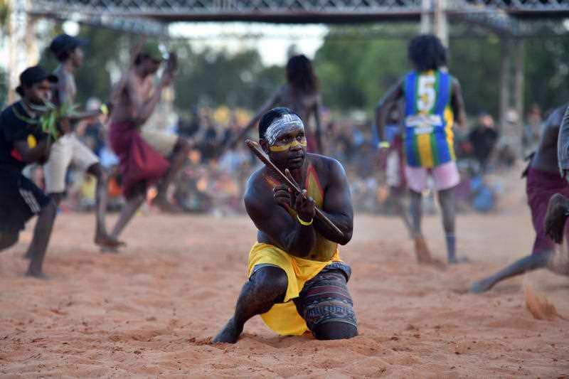 Members of the Yolngu people from north-eastern Arnhem Land perform the Bunggul traditional dance during the Garma Festival near Nhulunbuy, East Arnhem Land.