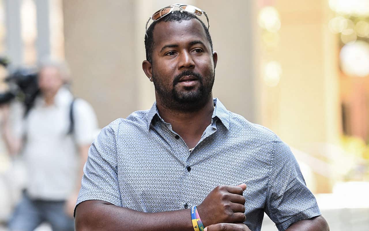 West Indies' Cricket player Dwayne Smith leaves the NSW Supreme Court in Sydney, Tuesday, October 24, 2017.
