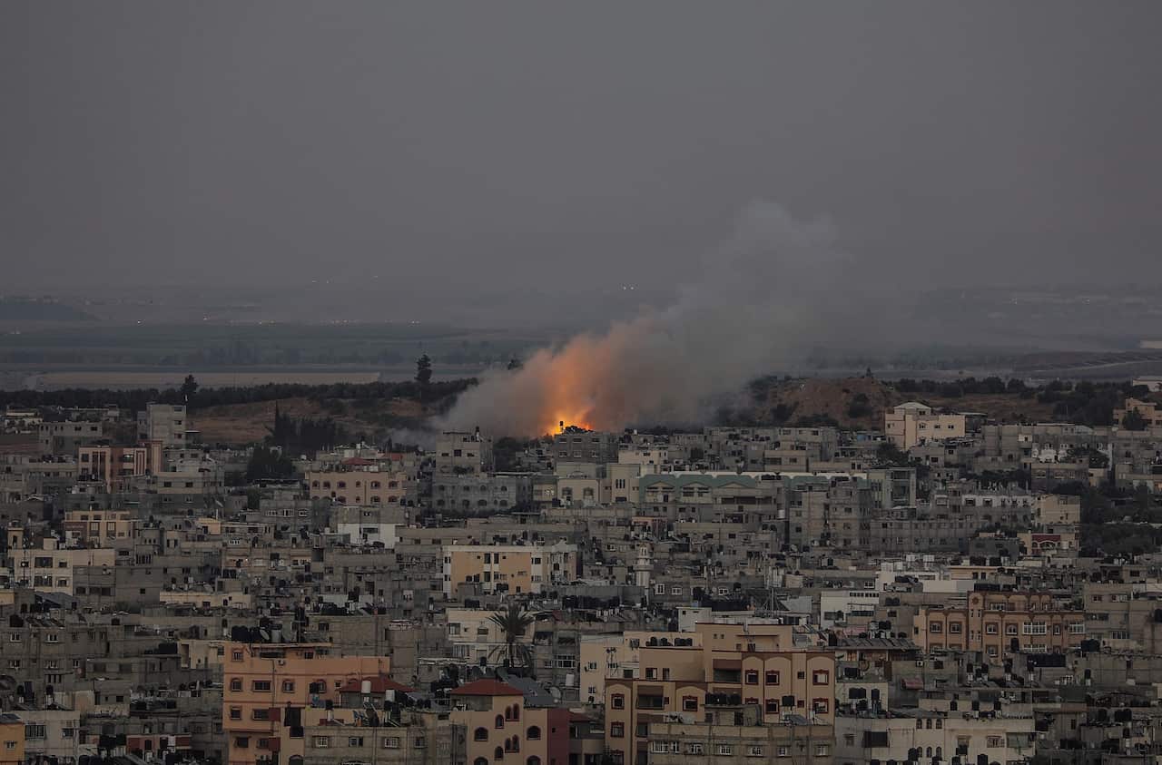 Smoke rises after an Israeli strike in Al Shejaeiya neighbourhood in the east of Gaza City, on 13 May 2021.