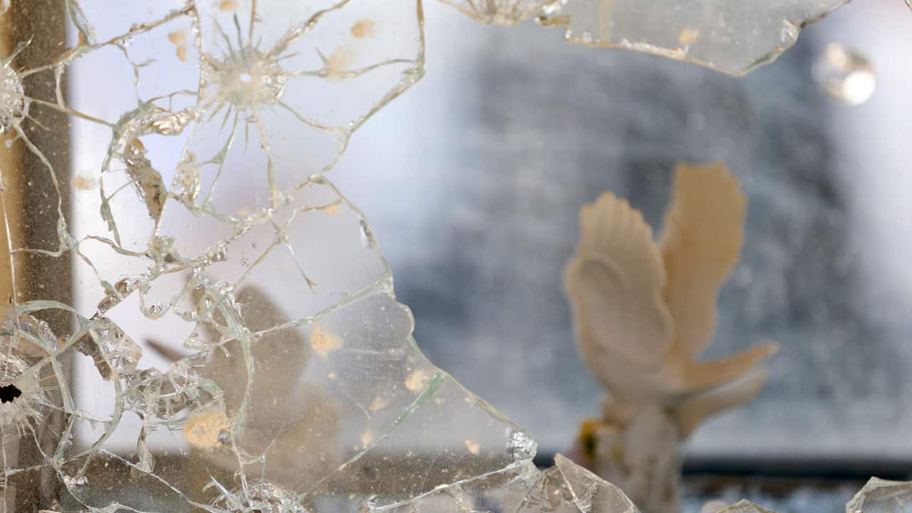 A shattered window is seen at a house is seen after a rocket fired from Gaza Strip hit in the southern Israeli city Kiryat Gat, Israel.