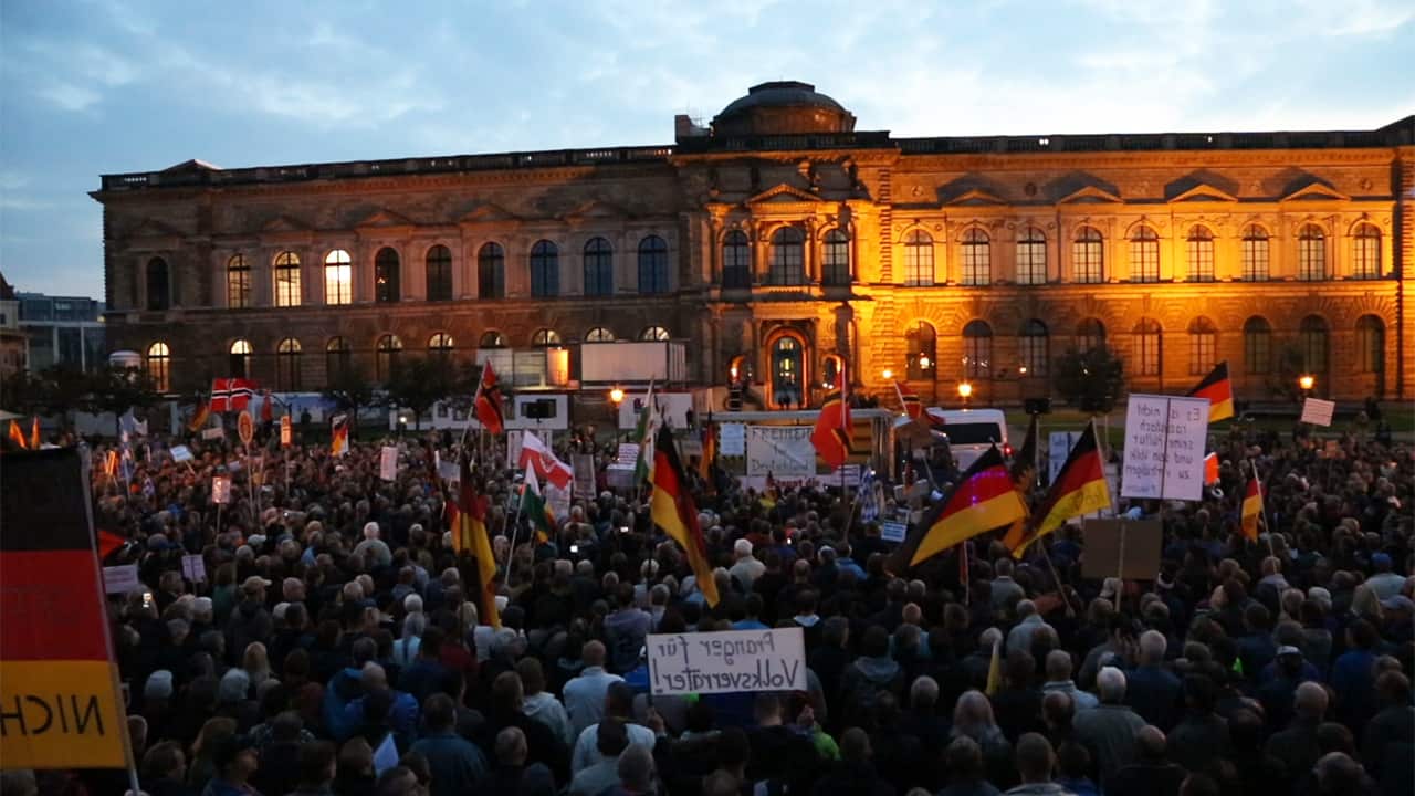 Protesters gather at an anti-immigration rally in Dresden.
