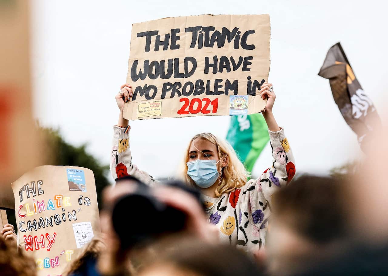 People attend Fridays For Future global climate action day in Berlin, Germany on 24 September 2021.