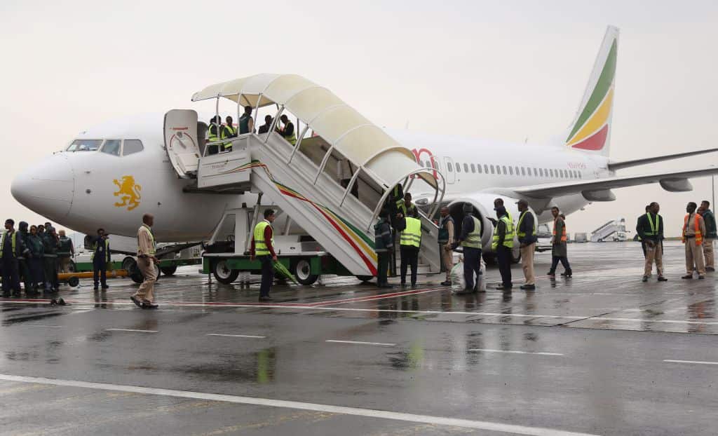 The plane and personnel are seen ahead of first flight restarting air service after 2 decades between Ethiopia and Eritrea, at the International Bole Airport in Addis Ababa, Ethiopia on July 18, 2018.