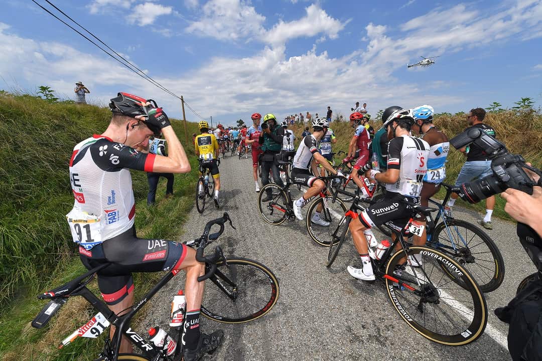 Cyclists stop due to the protest. 