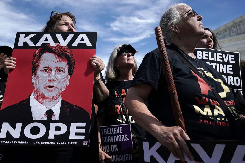 Protesters demonstrate against President Donald Trump's Supreme Court nominee Brett Kavanaugh in Washington, DC.