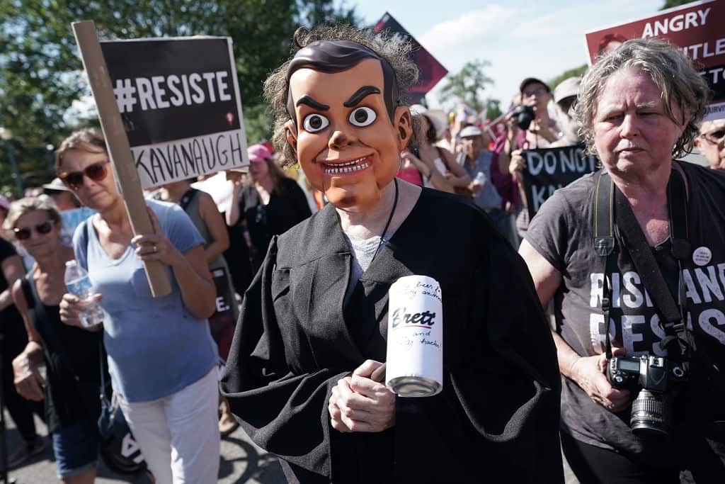 Activists rally against Brett Kavanaugh's nomination for the Supreme Court in Washington, DC.