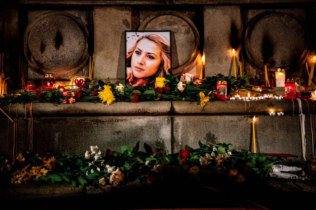 A portrait of slain Bulgarian television journalist Viktoria Marinova during in a candle-light vigil in the city of Rousse. 