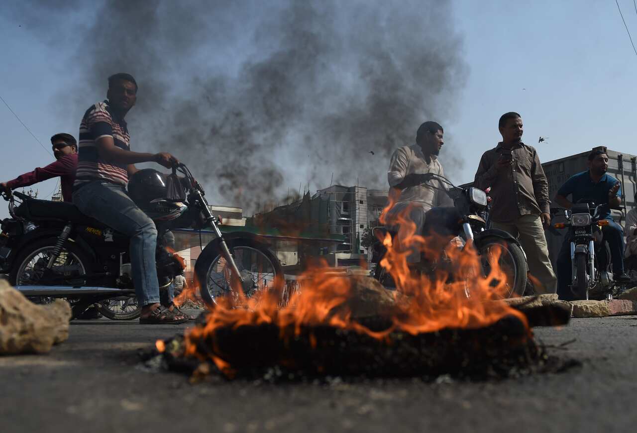 Supporters of Tehreek-e-Labaik Pakistan protest against the court decision to overturn the conviction of Christian woman Asia Bibi.