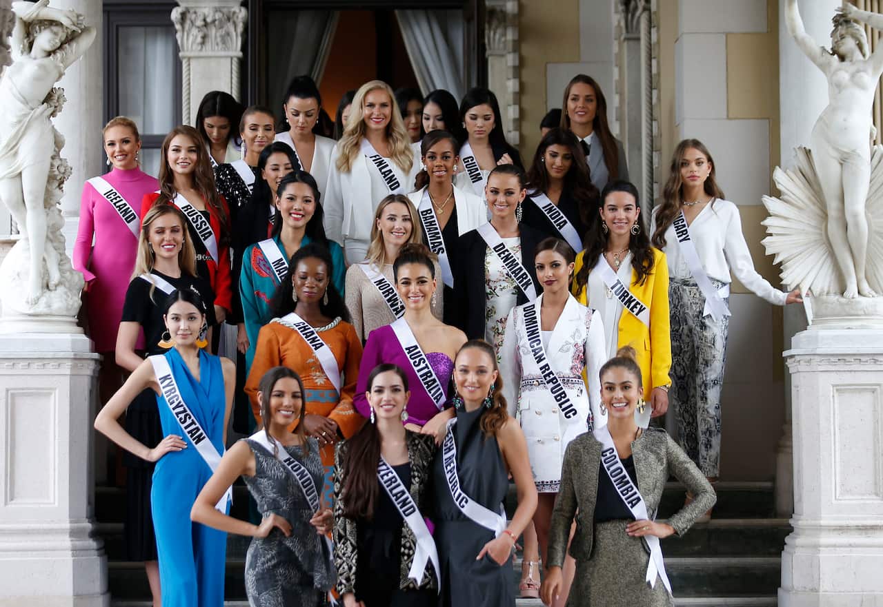 Francesca Hung with other Miss Universe 2018 contestants after meeting the Thai Prime Minister.