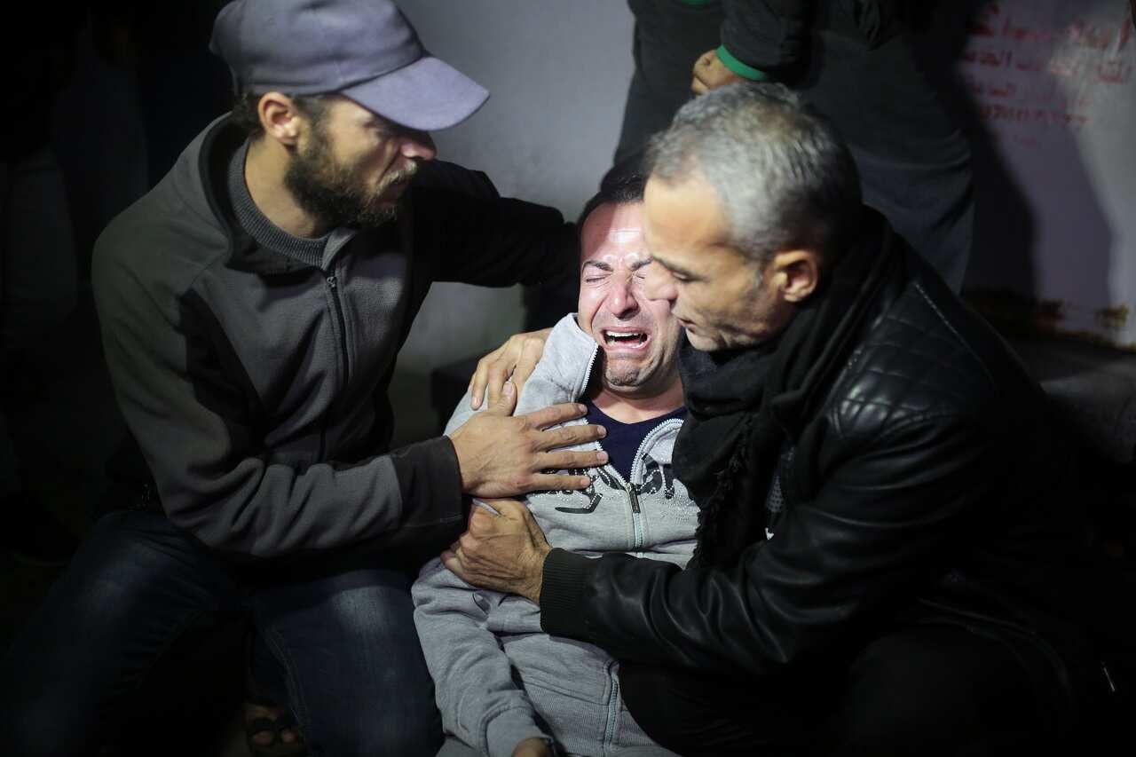 Relatives of a 16-year-old who was reportedly shot and killed by Israeli troops mourn in Gaza.