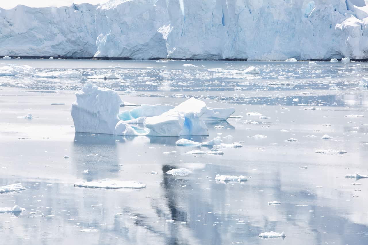A fractured and melting iceberg is seen in Antarctica.