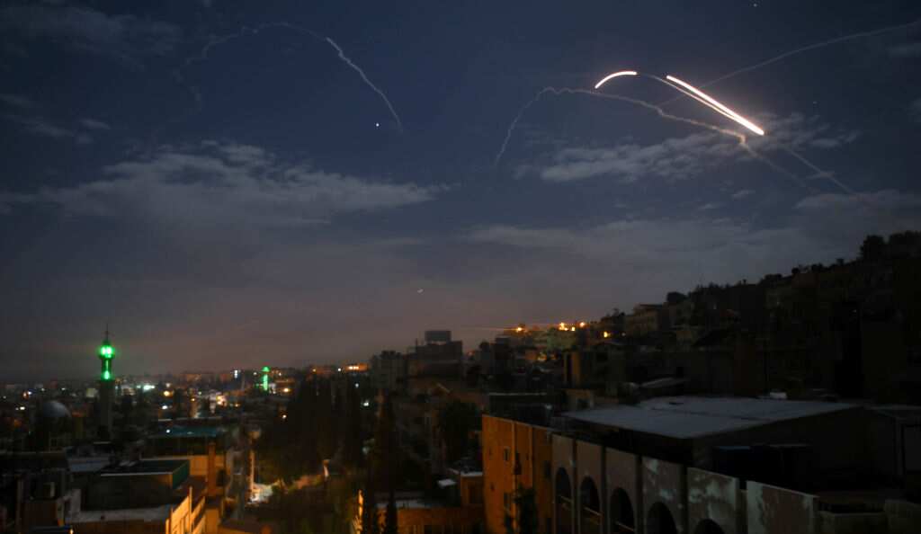 Israel struck what it said were Iranian targets in Syria in response to rocket fire it blamed on Iran, sparking concerns of an escalation.
