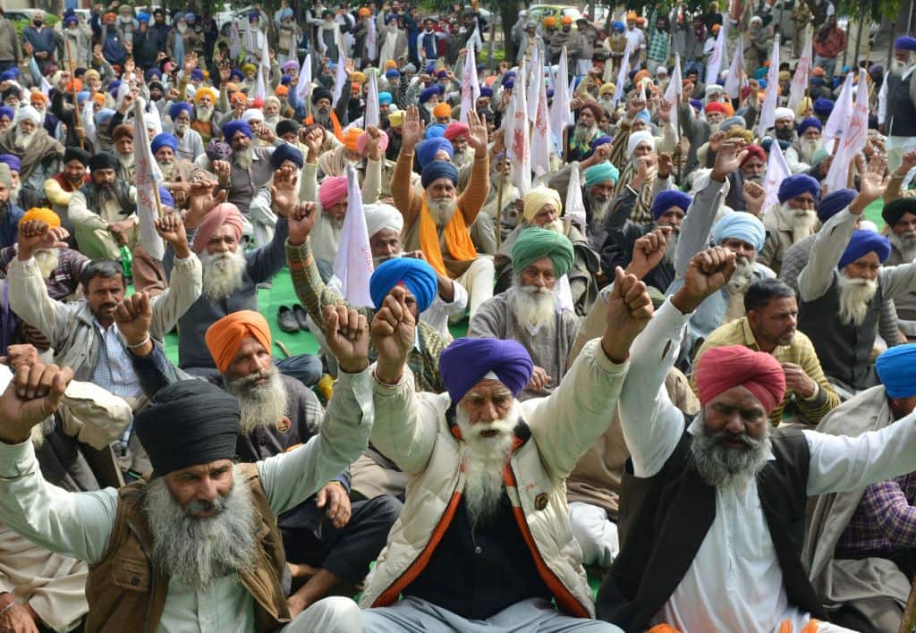 Indian farmers protesting in Amritsar, demanding complete farm debt waiver.
