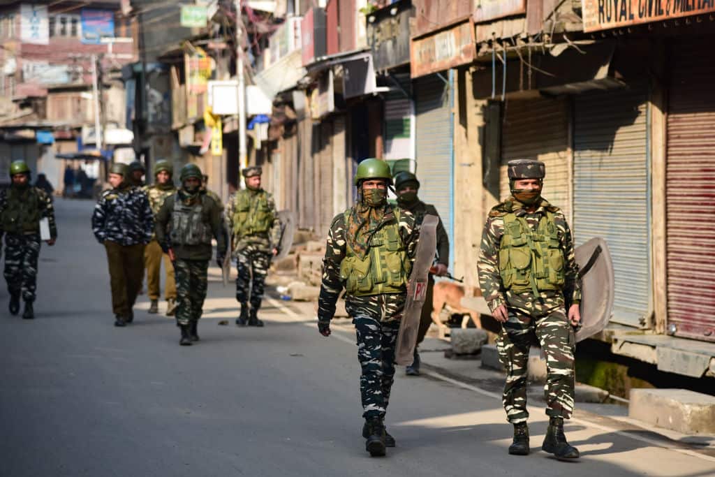 Indian paramilitary forces are seen patrolling the streets of Srinagar after clashes.