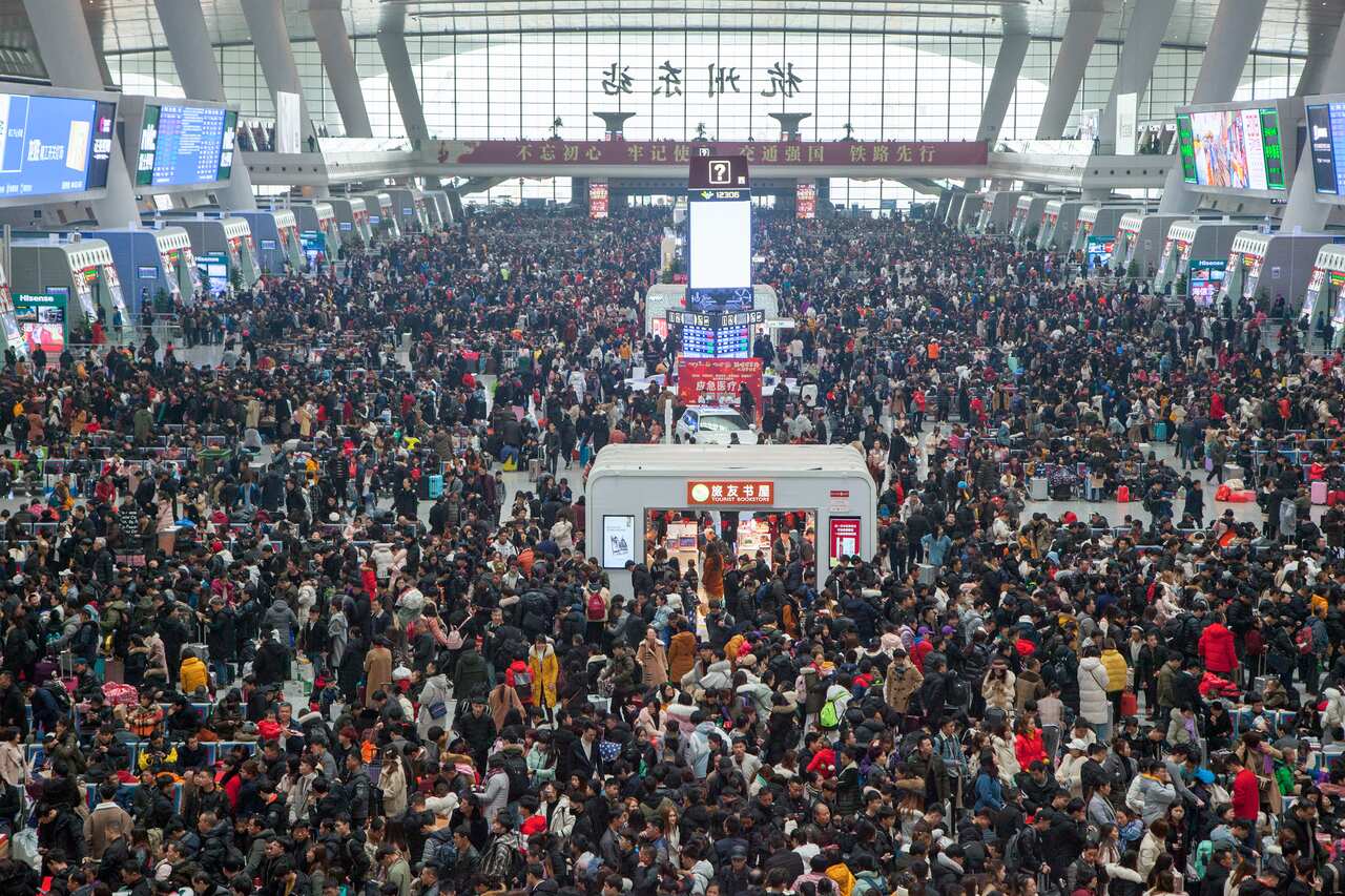 Hangzhou East Railway Station  in Hangzhou, in Zhejiang Province is clogged with mass crowds heading home for the celebrations. 