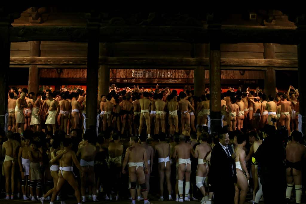 The men wear the same kind of loincloths as sumo wrestlers.