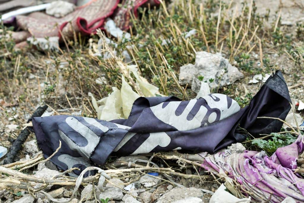 A discarded Islamic State flag.
