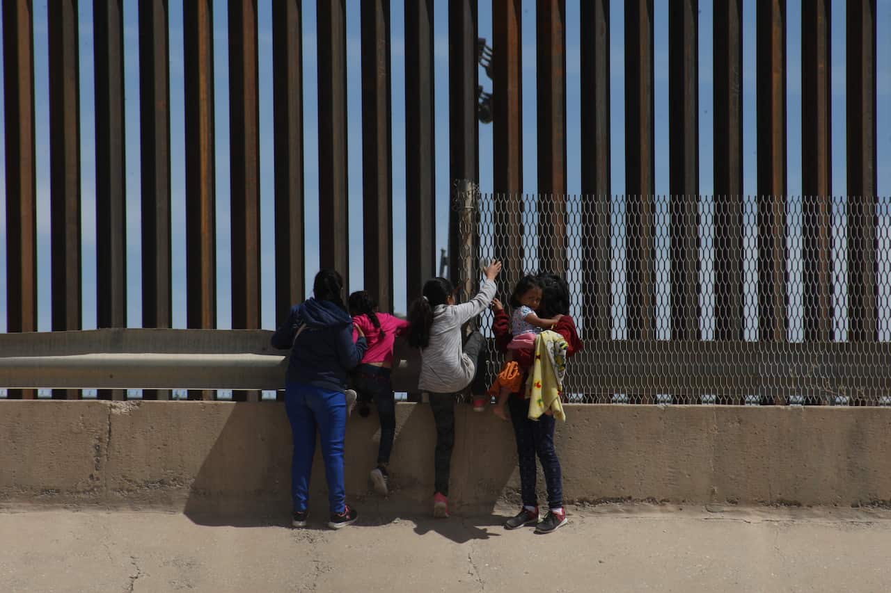 mother with her three daughters from Guatemala crossed Mexico to reach the United States in search of political asylum at the border City Juarez-El paso Texas on 9 April 2019.