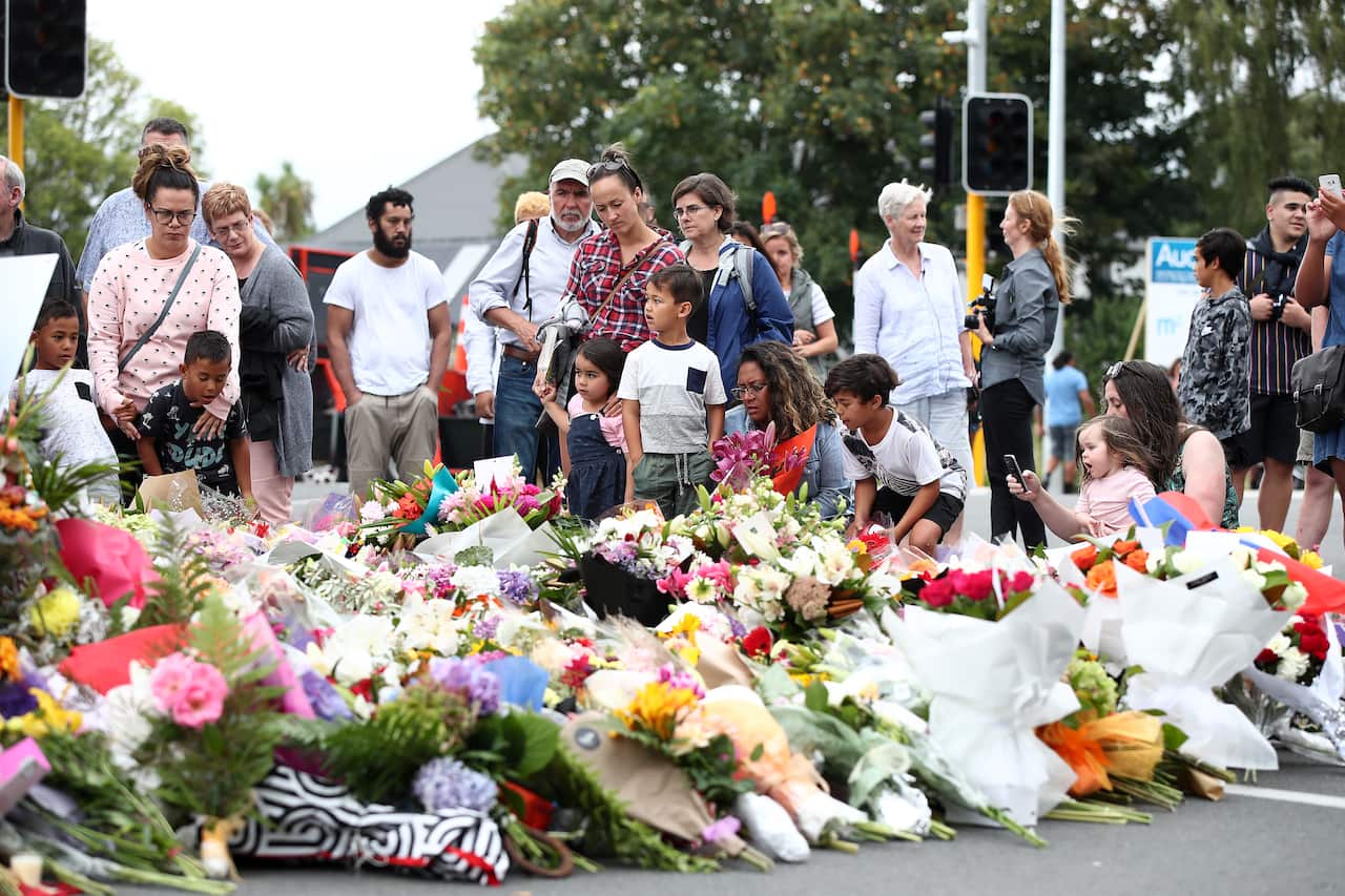 Mourners pay their respects at a makeshift memorial near the Masjid Al Noor mosque in Christchurch, New Zealand.