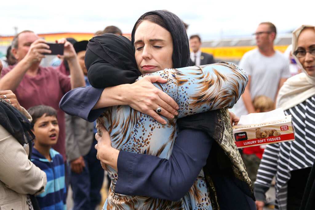NZ Prime Minister Jacinda Ardern hugs mourners in the wake of the Christchurch mosque attack. 