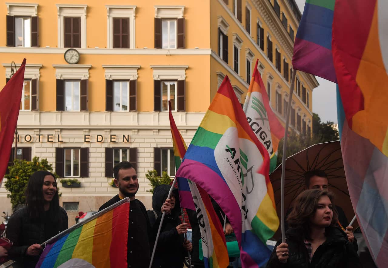 Activist from Italian LGBTI association Arcigay stage a protest outside Brunei-owned Hotel Eden.