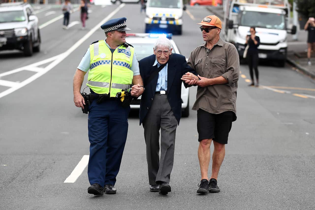 John Sato, a former Japaense serviceman, took two buses from Howick to join the march against racism in Auckland, New Zealand.